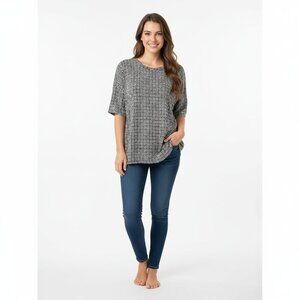 Lularoe size xxsmall black & white irma high low top